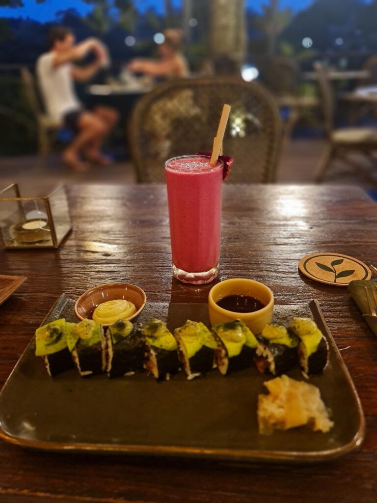 sushi and healthy smoothie in nice vegan restaurant