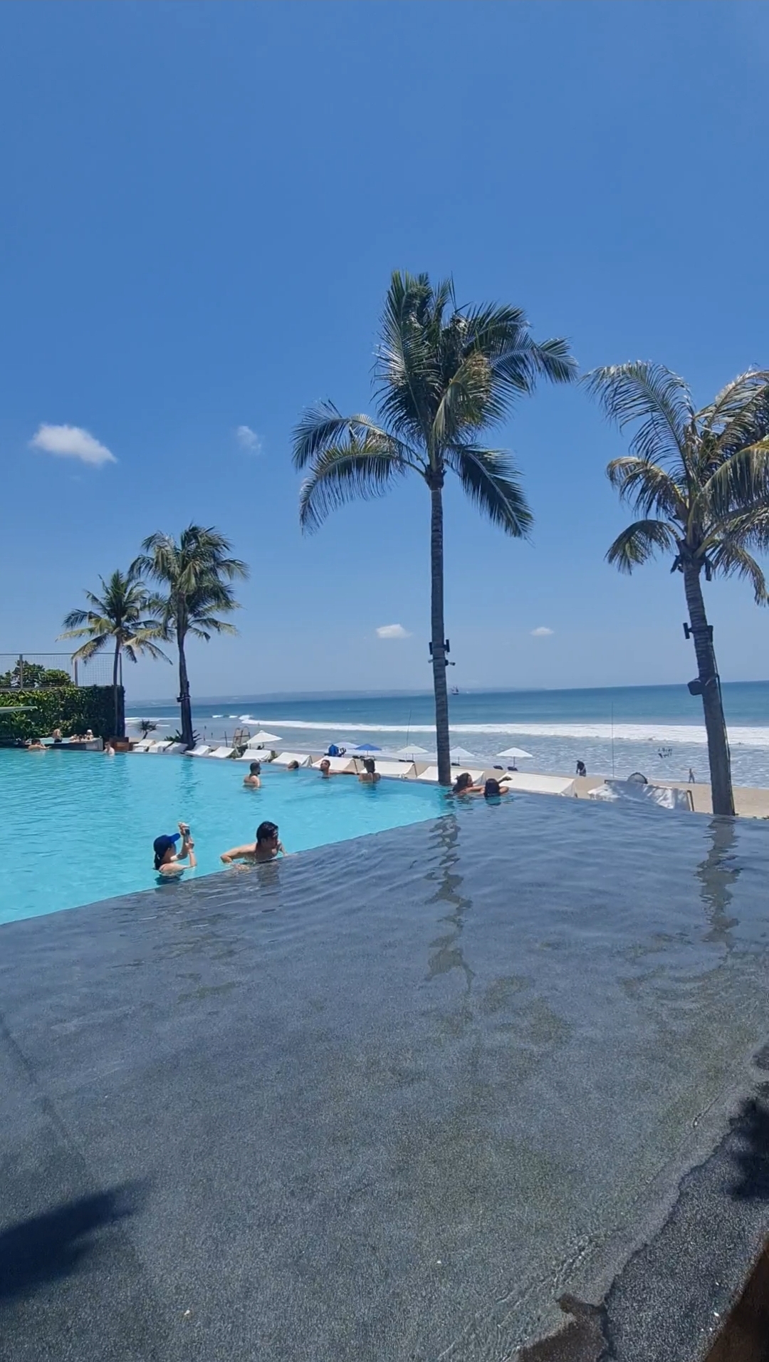 Pool and the beach in Potato Head