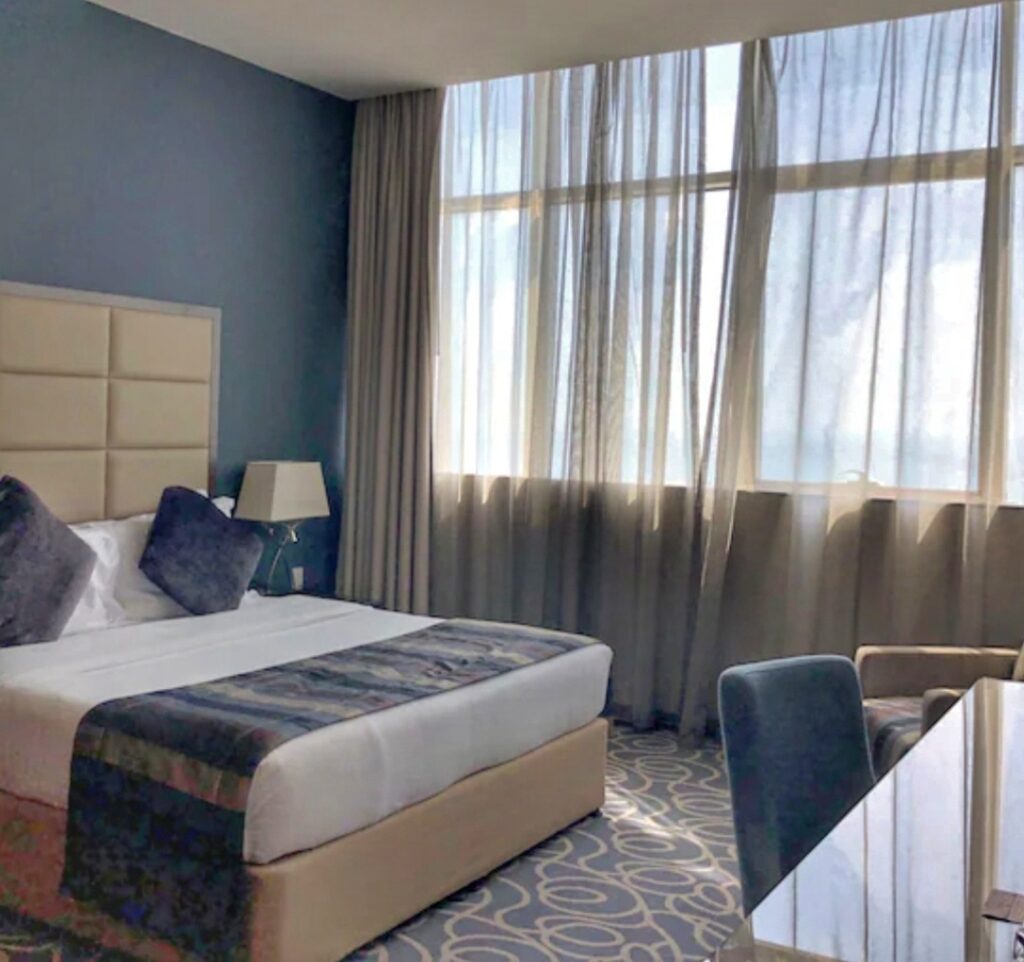 Sheikh Zayed Grand Mosque Spacious room with king size bed at Ramada Abu Dhabi