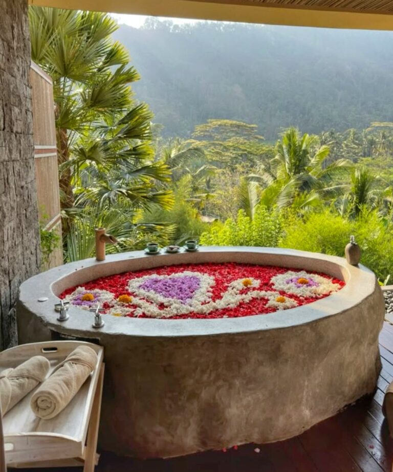 Spa massage with flower bath amidst lush rice fields in Ubud Bali