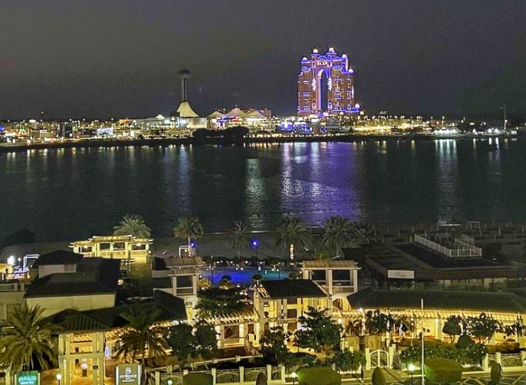 Night view of Corniche from Azura Lounge, at St. Regis