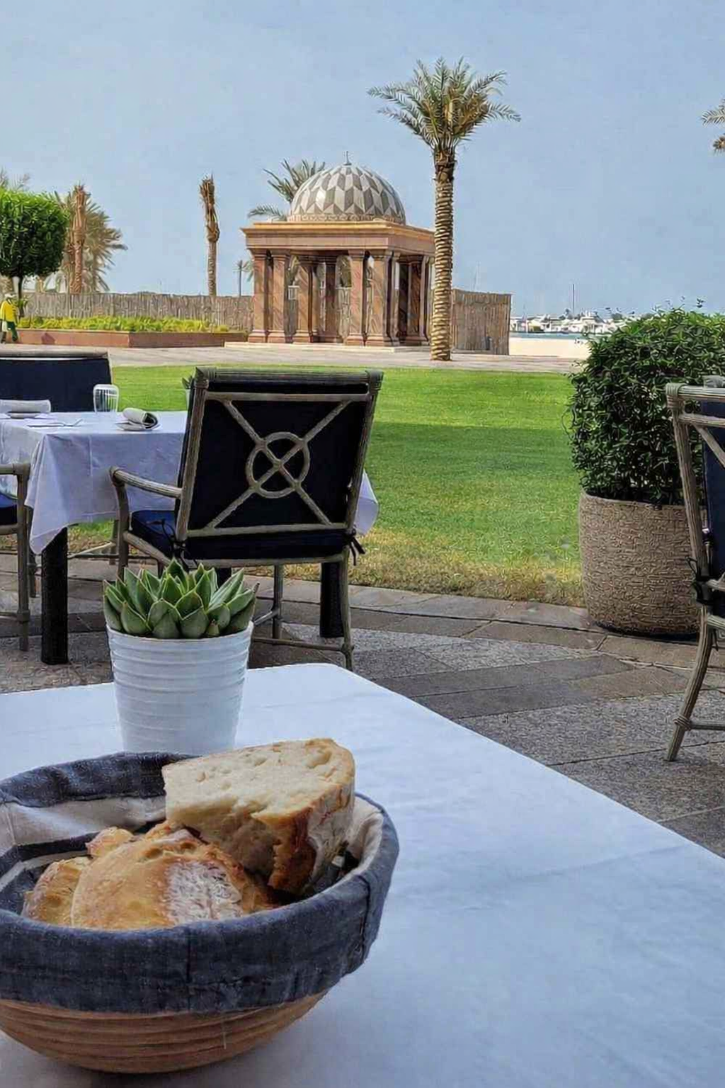 Bread on table at Talea restaurant with Abu Dhabi view