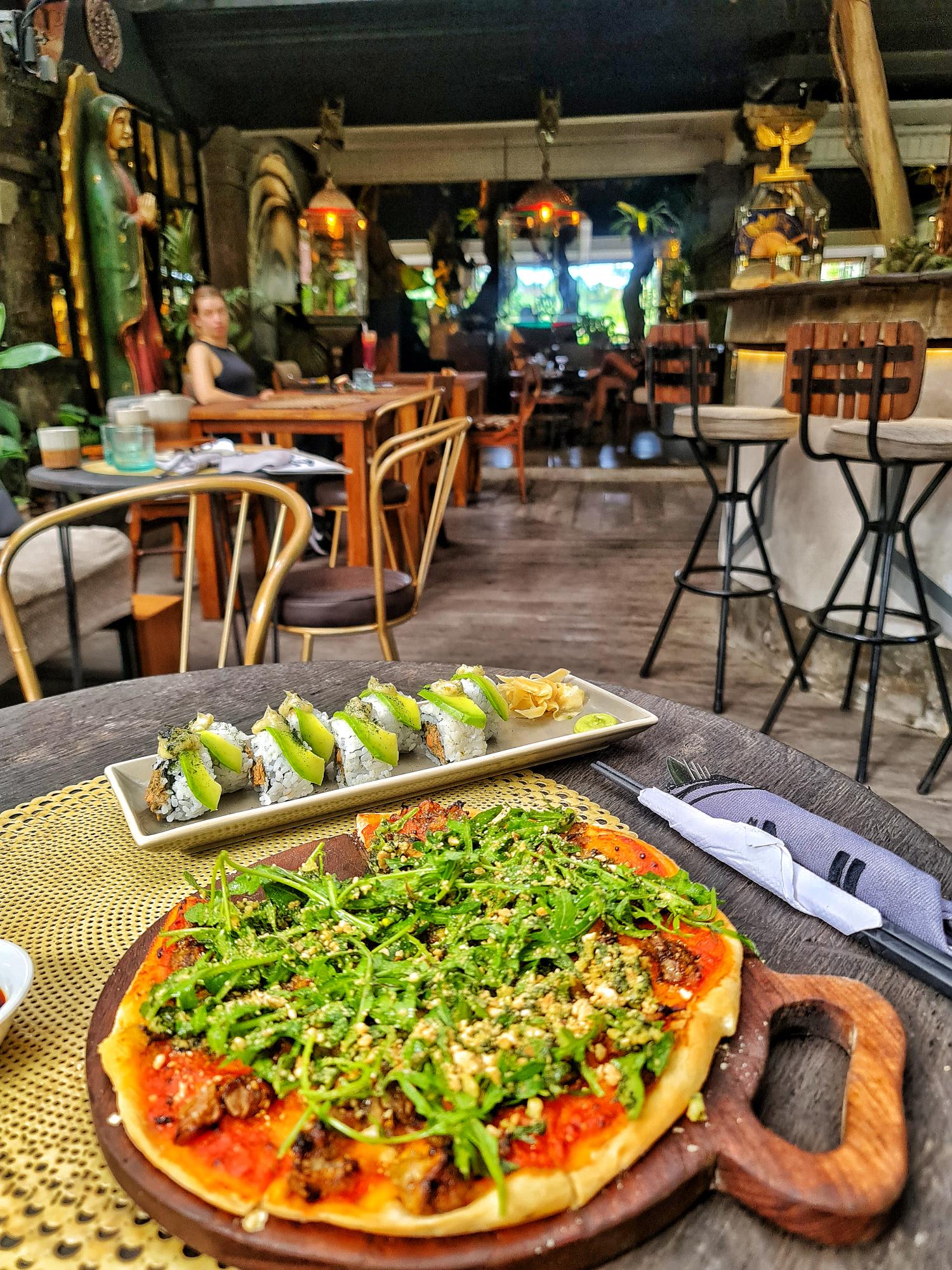 Healthy plant-based dishes at Zest Restaurant in Ubud Bali with jungle-inspired setting