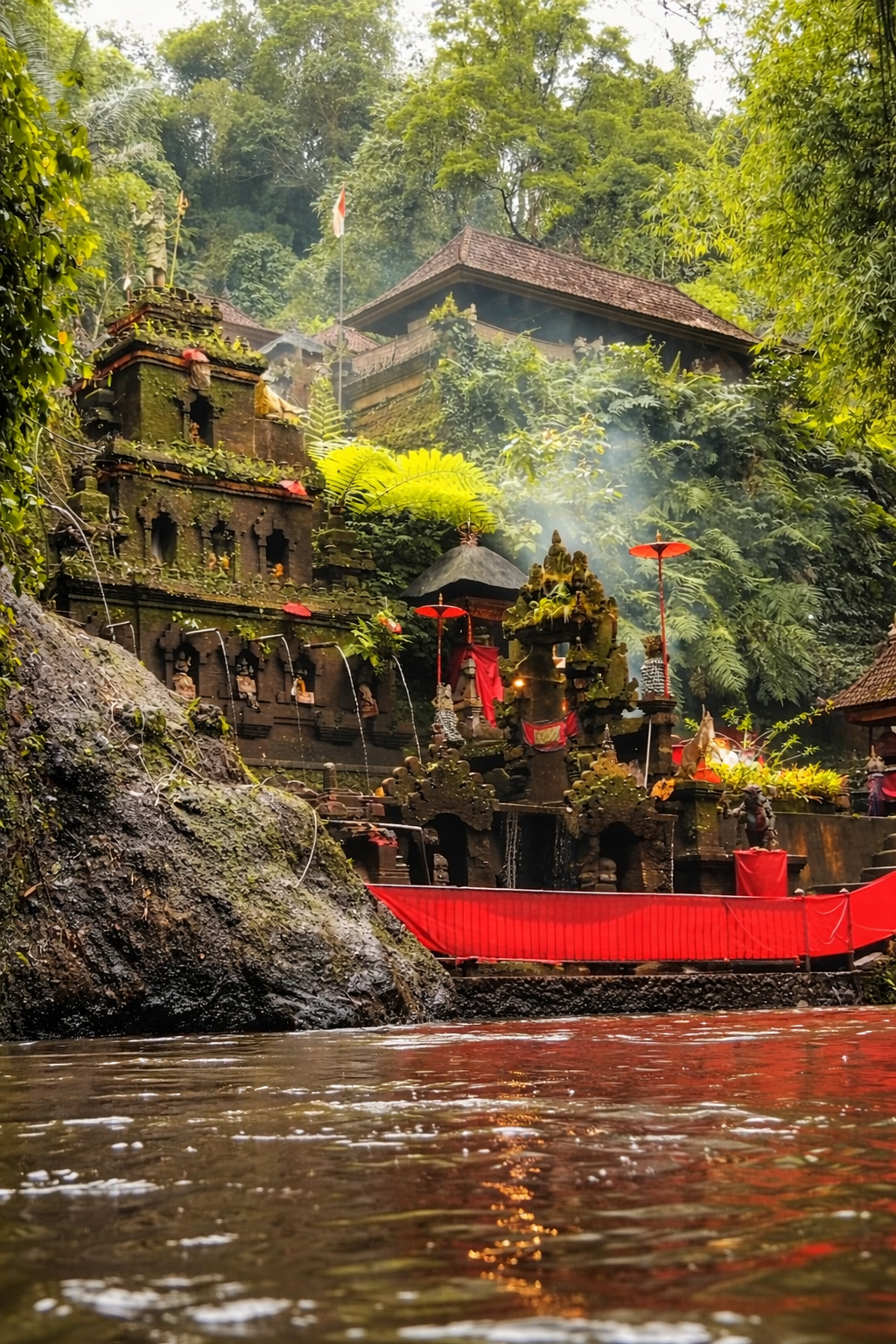 Balinese Melukat purification ritual at sacred spring in Ubud