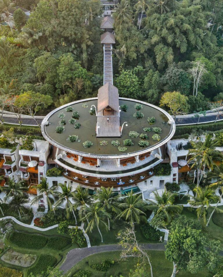 Aerial view from the top of a luxury hotel in Bali overlooking tropical landscape and greenery