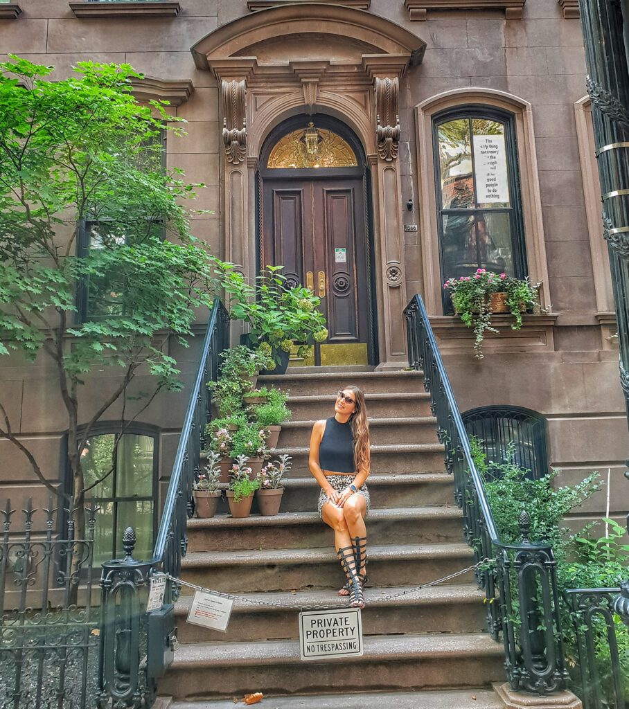 Visiting the famous Carrie Bradshaw apartment location in New York City’s West Village.
