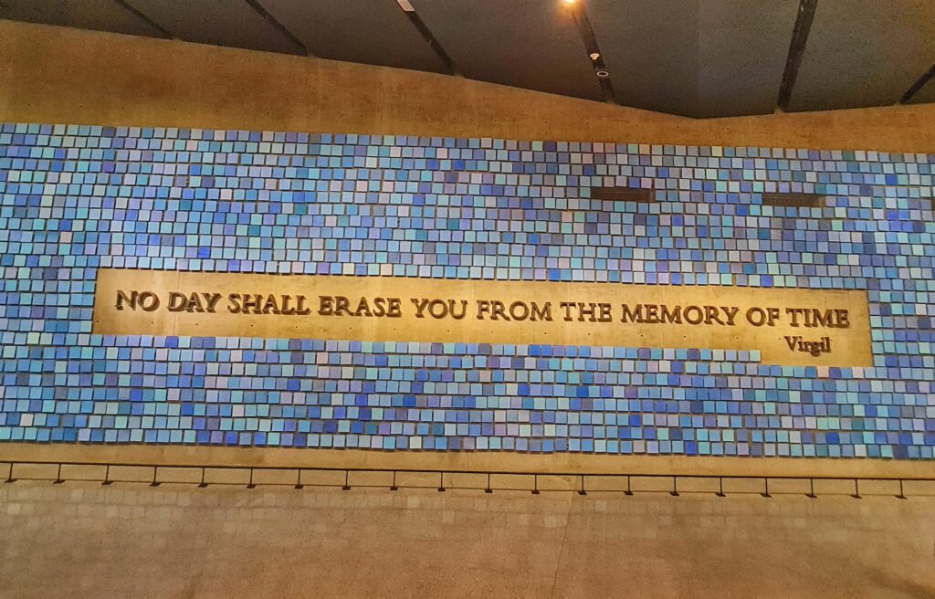 "No day shall erase you from the memory of time" inscription at the 9/11 Memorial Museum
