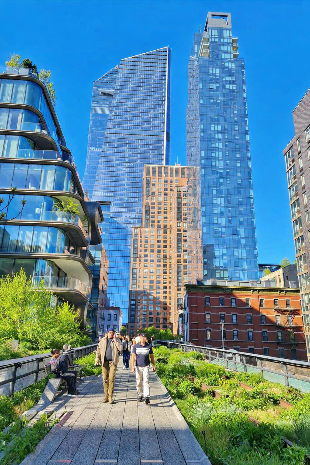 Walking along The High Line elevated park with city views and greenery