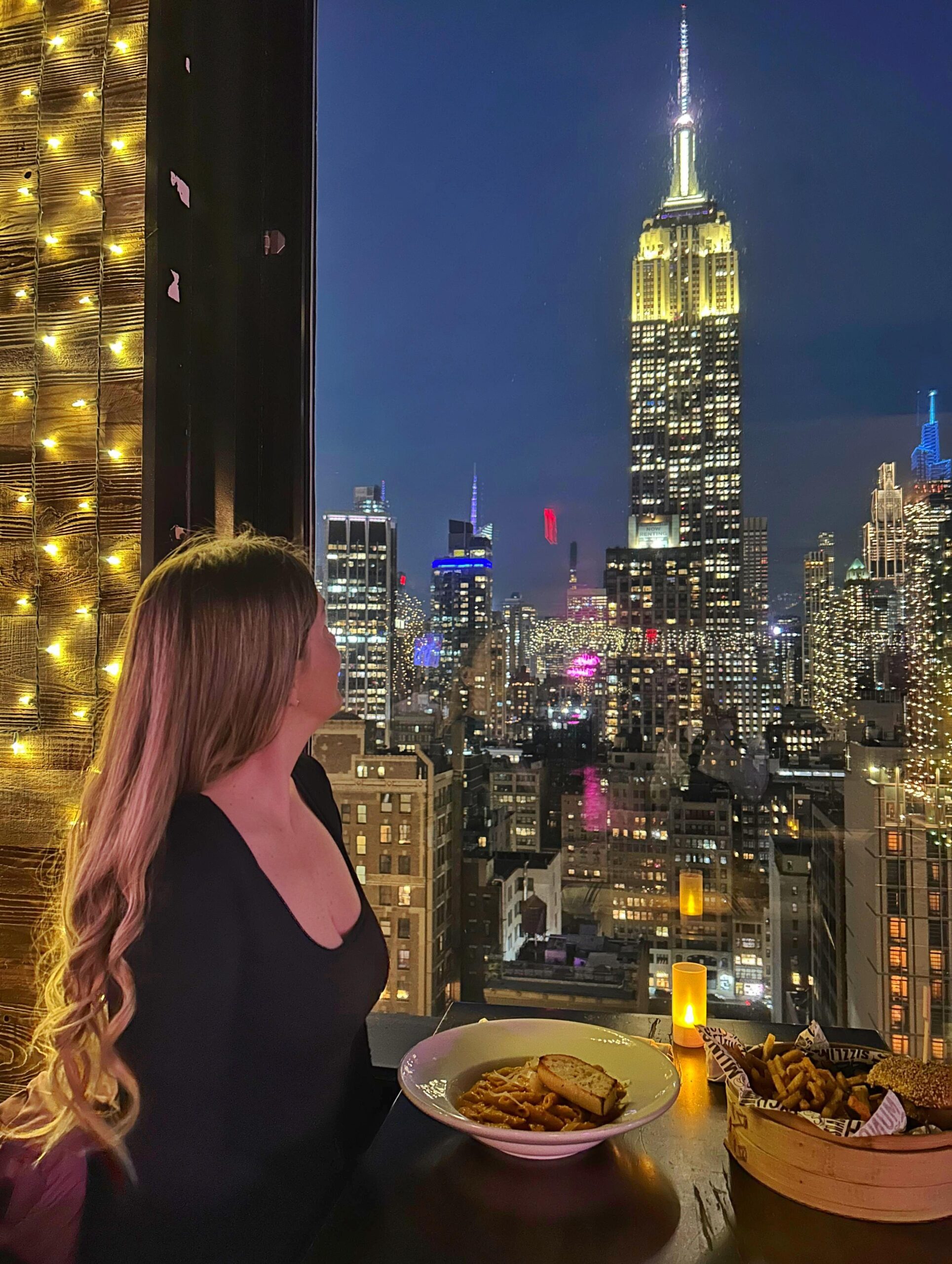 View from inside of the 230 Fifth Bar, overlooking Empire State building