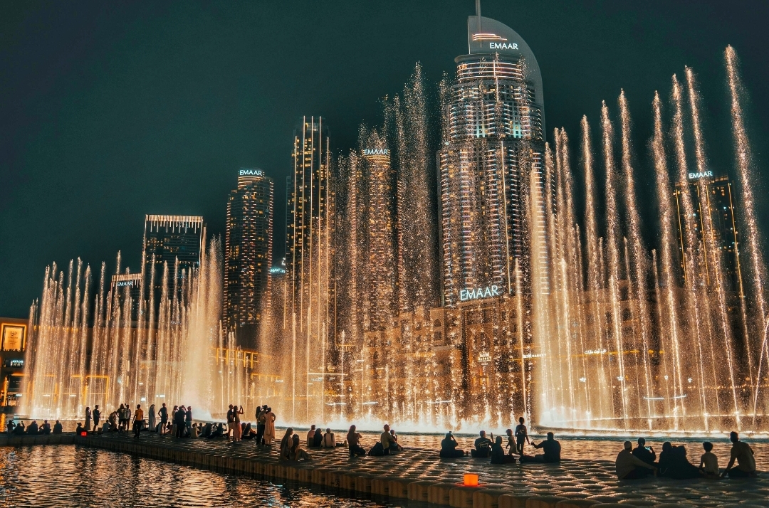 Dubai Fountain show at Burj Khalifa with illuminated water display at night