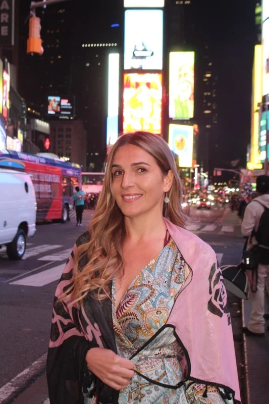 Maya, founder of Wander with Maya, sharing travel experiences